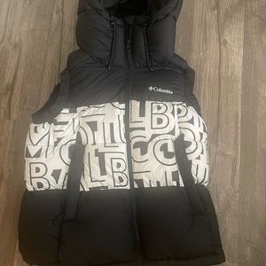 Columbia black and white puffer. Really thick. Like new